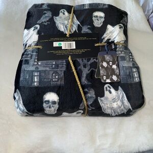 Rachel Roy ghosts,crows, haunted house
Skulls Throw